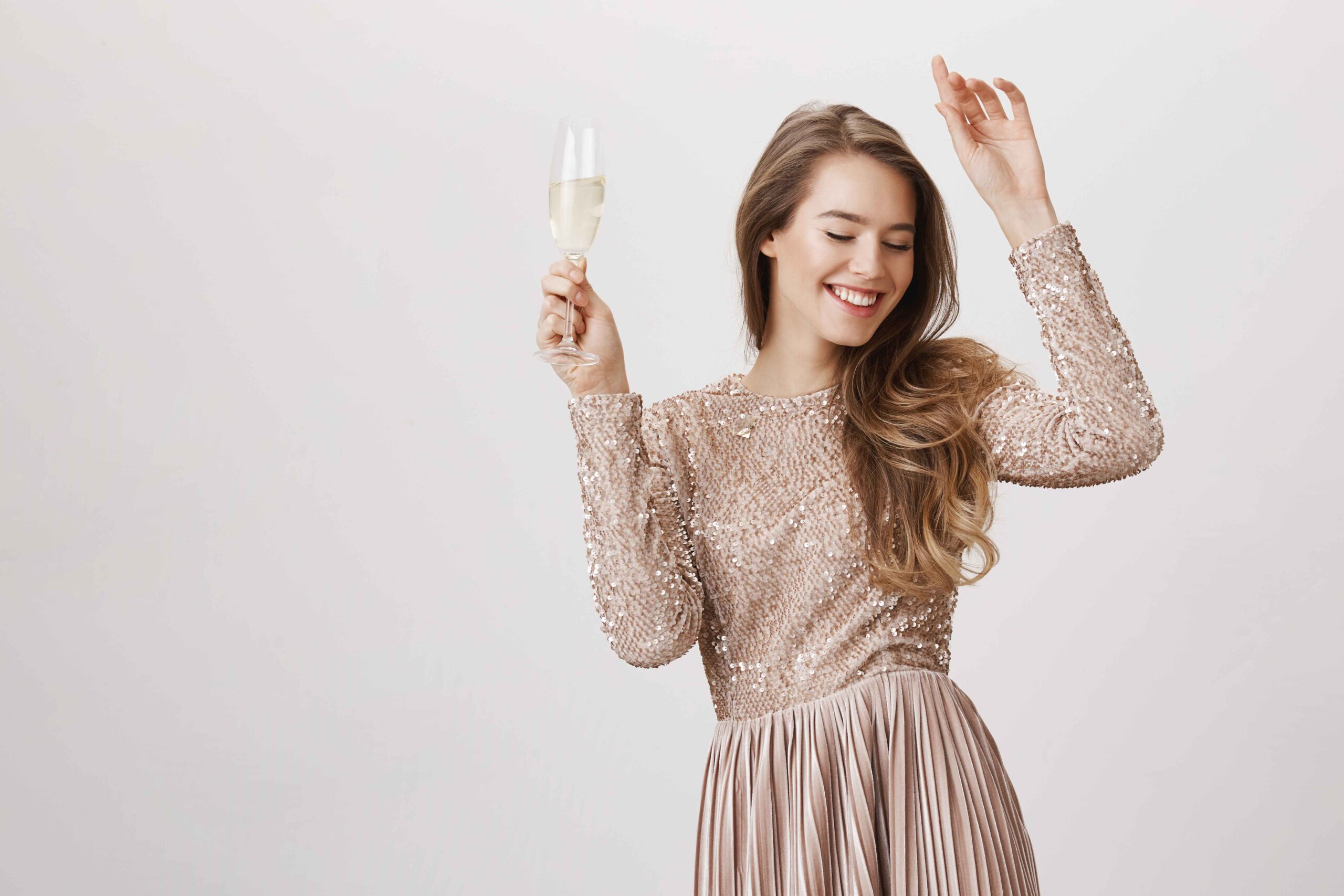 Elegant Woman in Evening Dress Celebrating with Champagne – Sugar Relationship Lifestyle